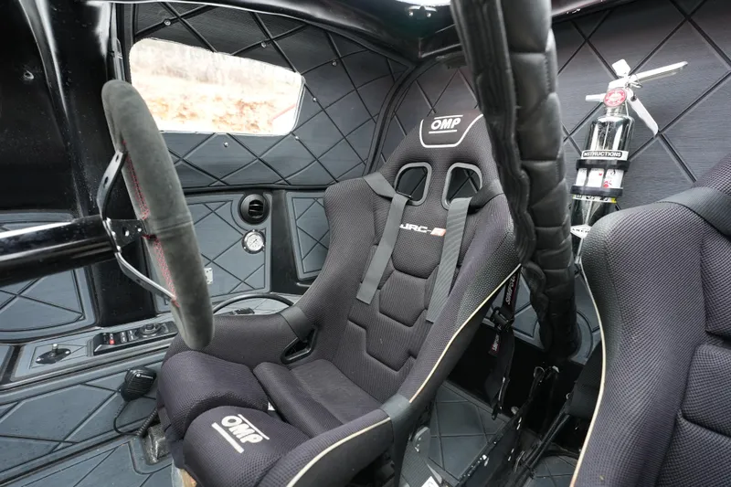 Slide: The Image of Interior of 2019 Wright Performance 320 Race car with racing seat and steering wheel. - 5