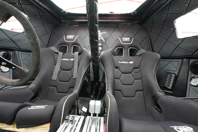 Slide: The Image of Interior of 2019 Wright Performance 320 Race car with OMP racing seats. - 6