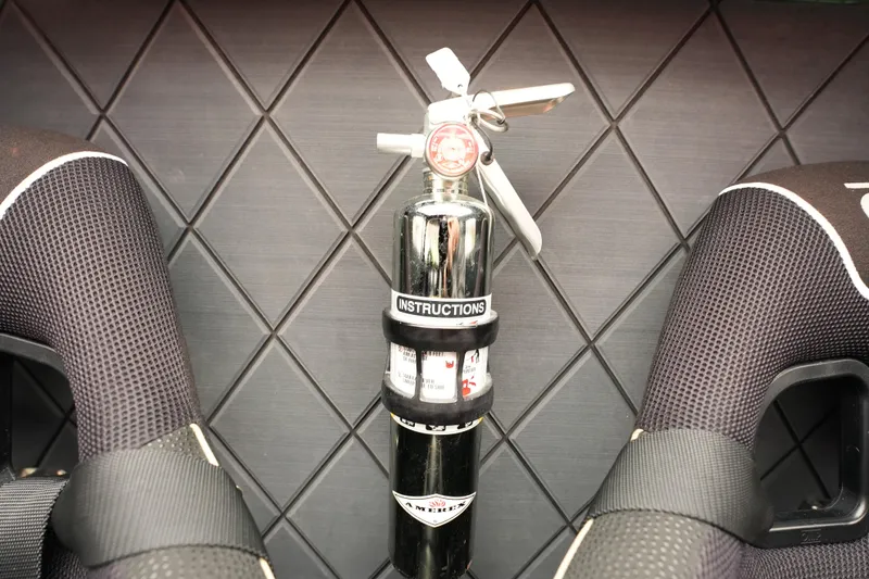 Slide: The Image of Fire extinguisher in 2019 Wright Performance 320 Race car interior. - 8
