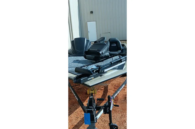 Slide: The Image of 2026 Tracker Pro Team 175 boat on trailer, parked outdoors. - 12