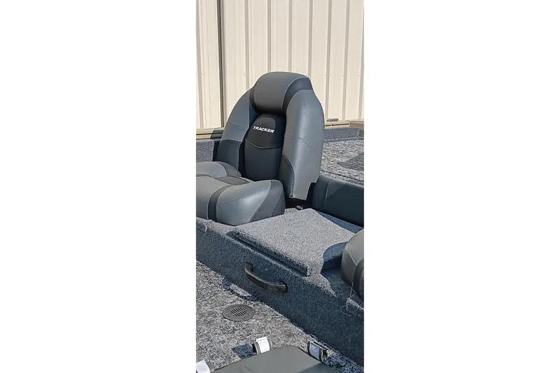 Slide: The Image of 2026 Tracker Pro Team 175 boat seat with gray upholstery and logo. - 16