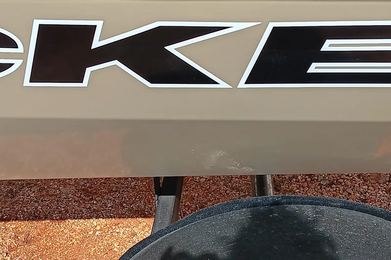 Slide: The Image of 2026 Tracker Pro Team 175 boat logo on a beige surface. - 19