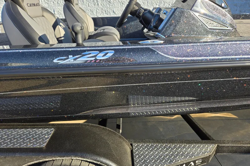Slide: The Image of 2026 Caymas CX 20 PRO boat with glittery finish and sleek design. - 3