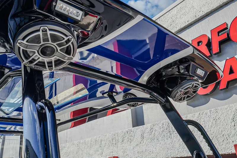 Slide: The Image of 2024 Renegade 38 Open boat speakers and canopy detail. - 10