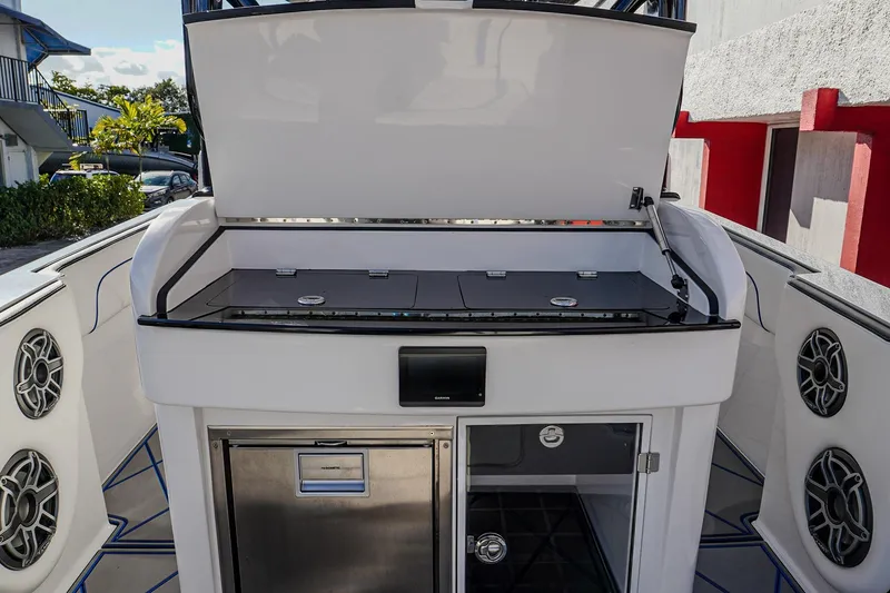 Slide: The Image of 2024 Renegade 38 Open boat interior with modern amenities and sleek design. - 19