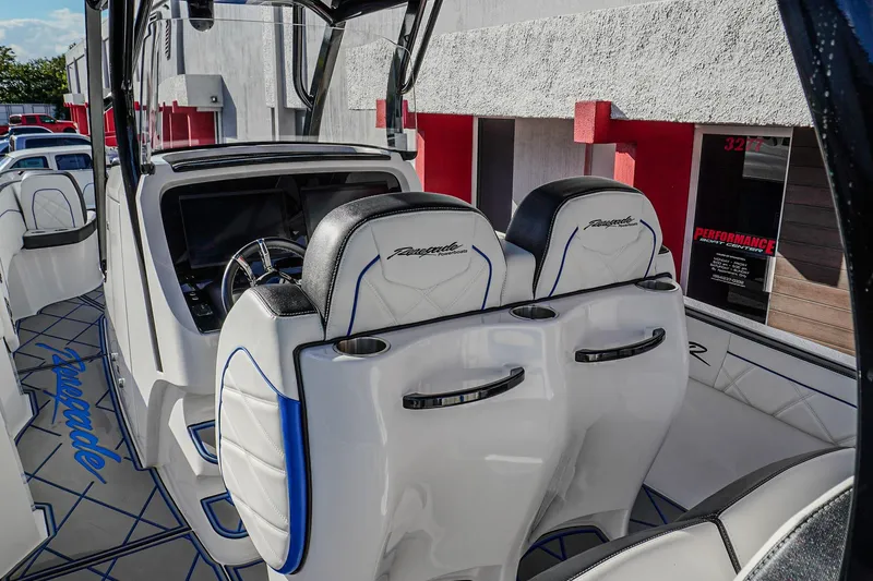 Slide: The Image of 2024 Renegade 38 Open boat interior with sleek seating and modern dashboard design. - 21