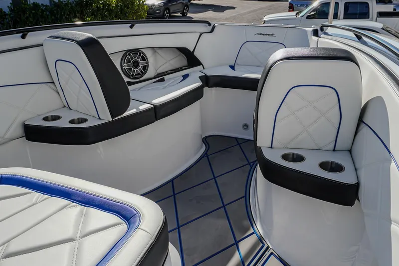 Slide: The Image of 2024 Renegade 38 Open boat interior with luxurious seating and cup holders. - 22
