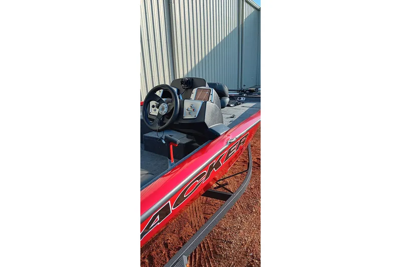 Slide: The Image of 2026 Tracker Pro Team 175 boat interior with steering wheel and controls. - 14