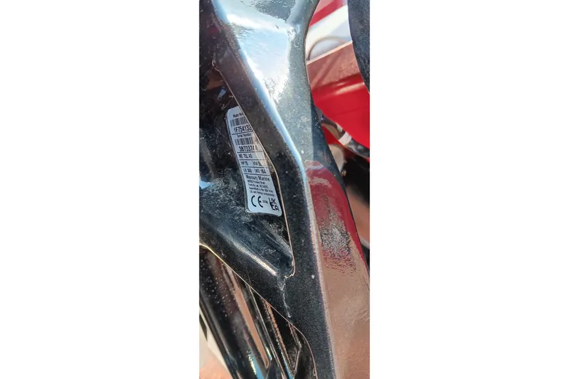 Slide: The Image of Close-up of a 2026 Tracker Pro Team 175 label on a metallic surface. - 18