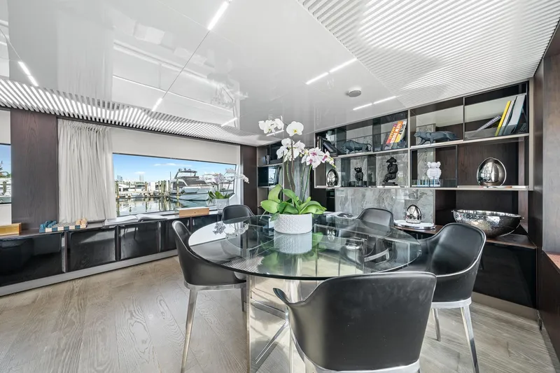Slide: The Image of Luxurious interior of 2018 Ferretti Yachts 850 with elegant dining area and modern decor. - 21