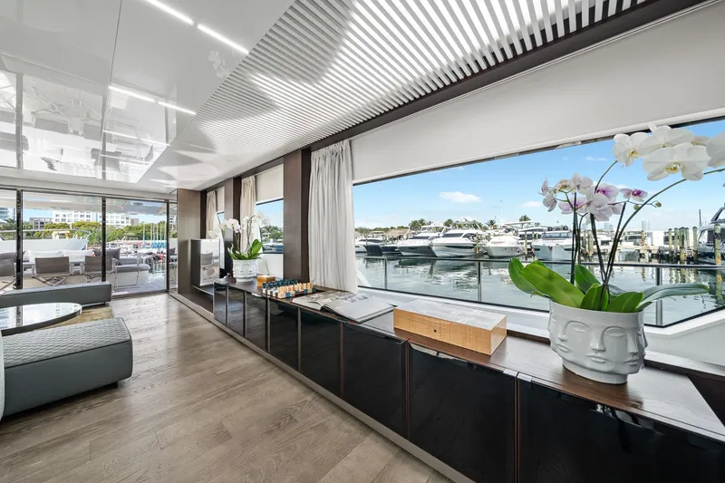 Slide: The Image of Luxurious interior of 2018 Ferretti Yachts 850 with waterfront view and elegant decor. - 22