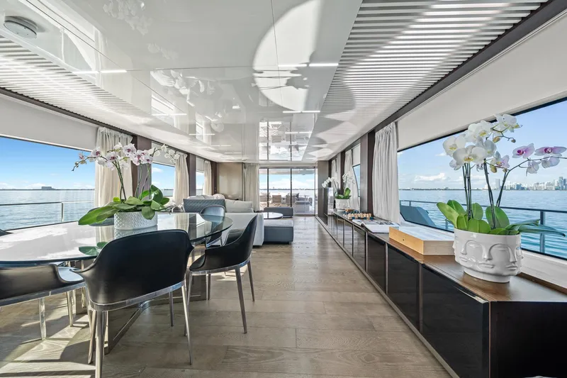 Slide: The Image of Luxurious interior of 2018 Ferretti Yachts 850 with elegant dining area and ocean views. - 31