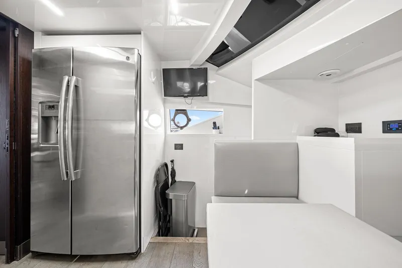 Slide: The Image of Modern interior of 2018 Ferretti Yachts 850 with stainless steel fridge and sleek design. - 36