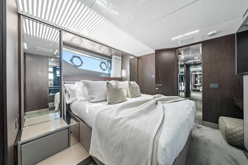 Slide: The Image of Luxurious bedroom interior of 2018 Ferretti Yachts 850 with modern design and elegant furnishings. - 43