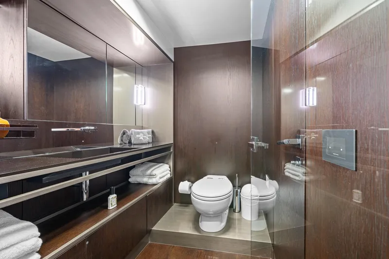 Slide: The Image of Luxurious bathroom in 2018 Ferretti Yachts 850, featuring sleek wood finishes and modern fixtures. - 45