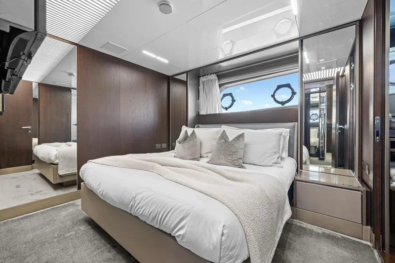 Slide: The Image of Luxurious bedroom interior of 2018 Ferretti Yachts 850 with modern design and elegant furnishings. - 50