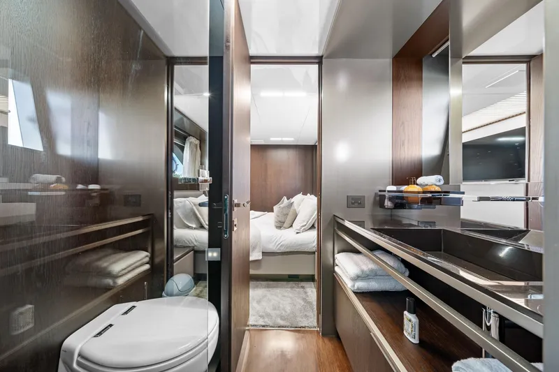 Slide: The Image of Luxurious bathroom and bedroom interior of 2018 Ferretti Yachts 850, featuring modern design elements. - 54