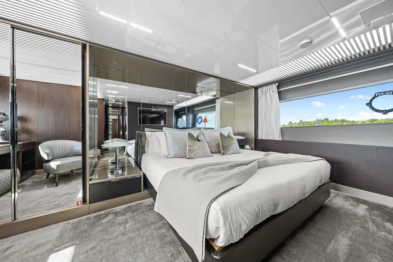 Slide: The Image of Luxurious bedroom interior of 2018 Ferretti Yachts 850 with modern design and scenic window view. - 59