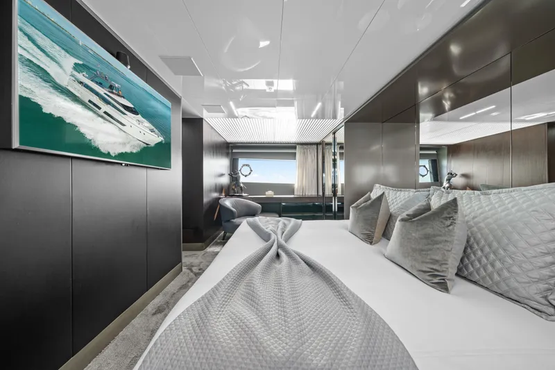Slide: The Image of Luxurious bedroom interior of 2018 Ferretti Yachts 850, featuring elegant decor and modern amenities. - 63