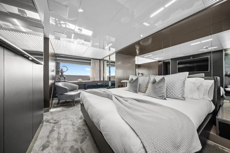Slide: The Image of Luxurious bedroom interior of 2018 Ferretti Yachts 850, featuring elegant decor and modern amenities. - 64