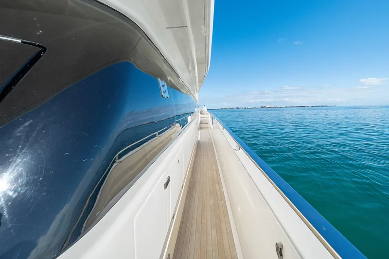 Slide: The Image of 2018 Ferretti Yachts 850 side deck view with ocean backdrop. - 78