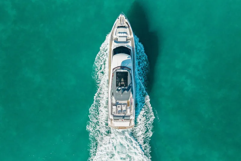 Slide: The Image of Aerial view of 2018 Ferretti Yachts 850 cruising in turquoise waters. - 8