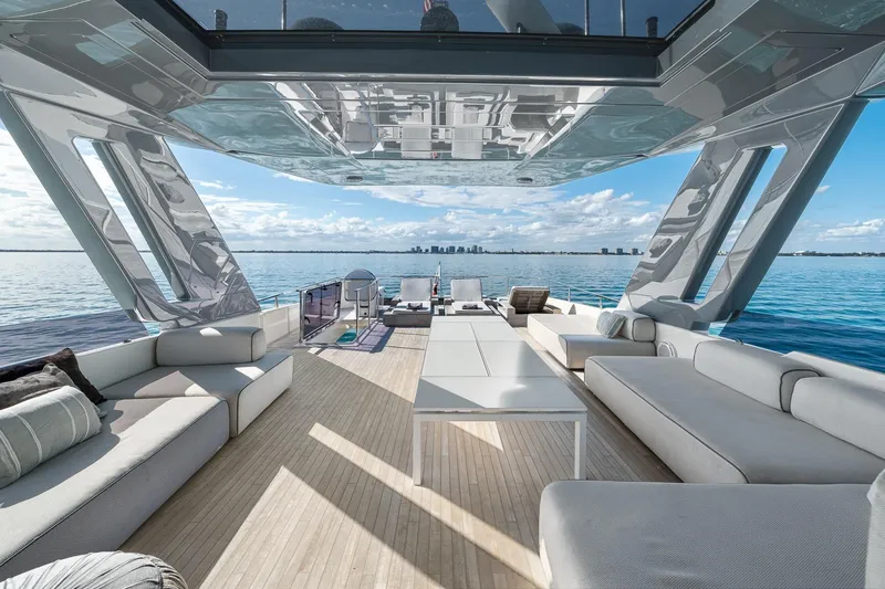 Slide: The Image of Luxurious 2018 Ferretti Yachts 850 interior with ocean view and modern seating. - 81