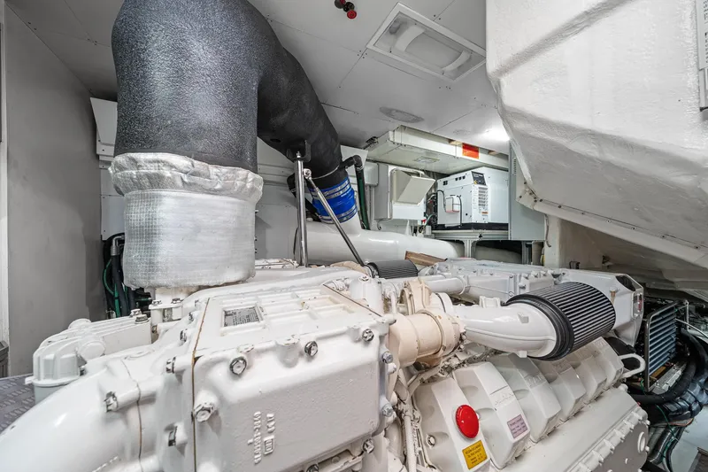 Slide: The Image of Engine room of 2018 Ferretti Yachts 850, showcasing advanced machinery and components. - 98