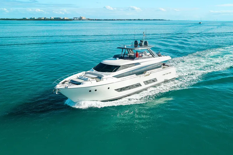 Slide: The Image of 2018 Ferretti Yachts 850 cruising on clear blue ocean waters. - 11