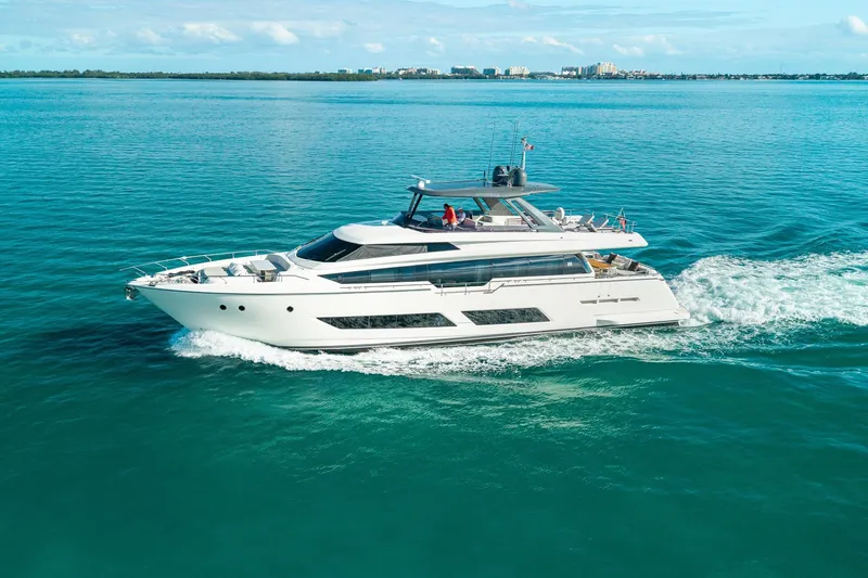 Slide: The Image of 2018 Ferretti Yachts 850 cruising on clear blue ocean waters. - 12