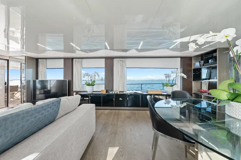 Slide: The Image of Luxurious interior of 2018 Ferretti Yachts 850 with ocean view, modern decor, and elegant furnishings. - 29
