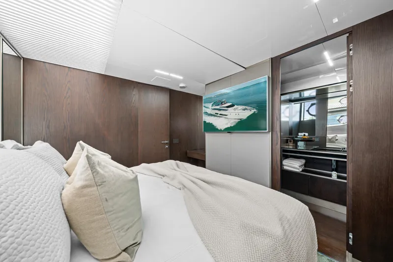 Slide: The Image of Luxurious bedroom interior of 2018 Ferretti Yachts 850 with modern design and elegant furnishings. - 47