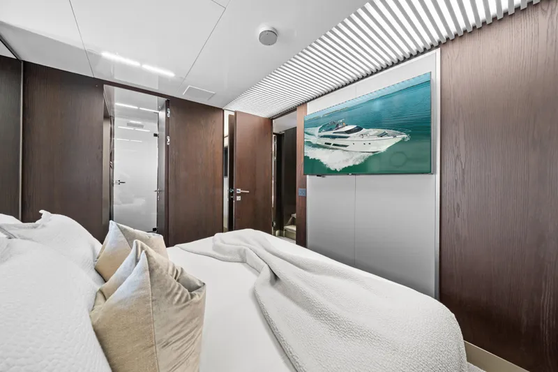 Slide: The Image of Luxurious bedroom interior on 2018 Ferretti Yachts 850, featuring modern design and elegant decor. - 51