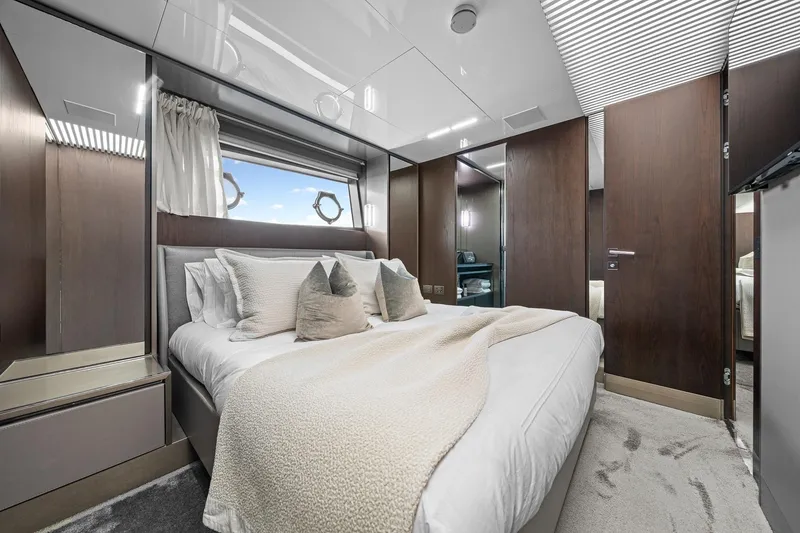Slide: The Image of Luxurious bedroom interior of 2018 Ferretti Yachts 850, featuring elegant design and modern amenities. - 52