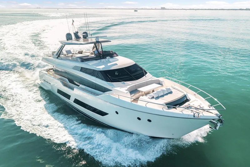 The Image of Luxurious 2018 Ferretti Yachts 850 cruising on open water, showcasing sleek design and elegance. - 6