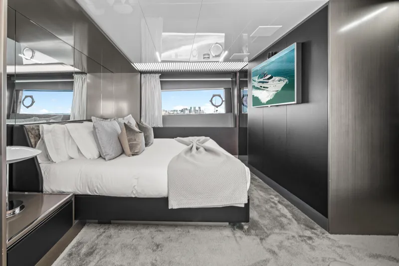 Slide: The Image of Luxurious bedroom interior of 2018 Ferretti Yachts 850 with modern decor and ocean view. - 62