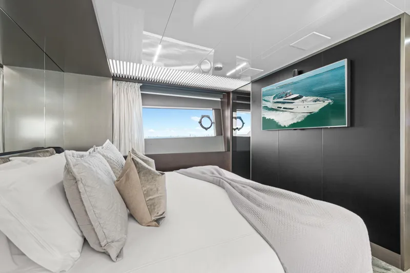 Slide: The Image of Luxurious bedroom interior of 2018 Ferretti Yachts 850 with modern decor and ocean view. - 66