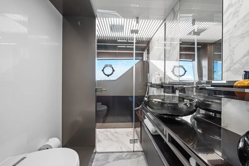 Slide: The Image of Luxurious bathroom interior of 2018 Ferretti Yachts 850 with modern fixtures and marble accents. - 69