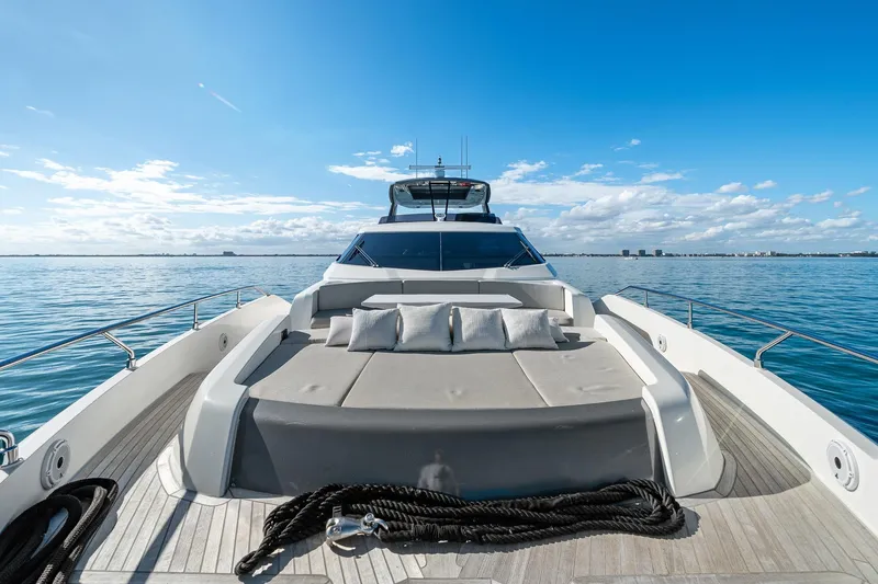 Slide: The Image of Luxurious 2018 Ferretti Yachts 850 on serene blue waters under clear skies. - 72