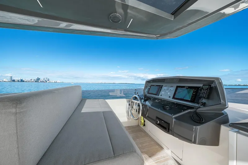 Slide: The Image of Helm of 2018 Ferretti Yachts 850 with city skyline view. - 86