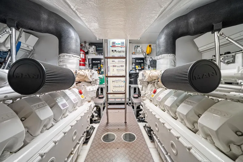 Slide: The Image of Engine room of 2018 Ferretti Yachts 850, featuring dual MAN engines and control systems. - 95