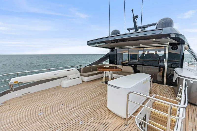 Slide: The Image of Luxurious 2024 Princess X80 yacht deck with modern seating and ocean view. - 101