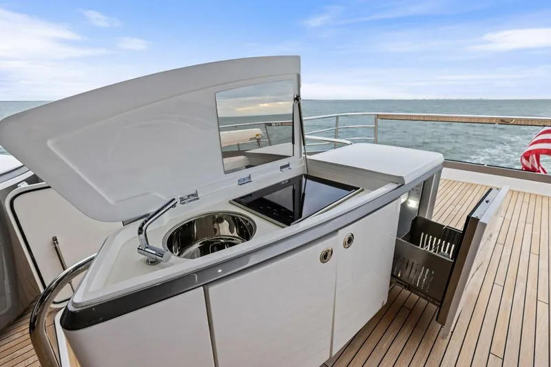 Slide: The Image of Luxury yacht Princess X80 2024 outdoor kitchen with ocean view. - 108