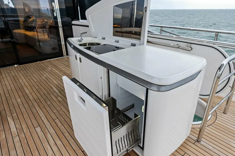 Slide: The Image of Outdoor kitchen on 2024 Princess X80 yacht with ocean view and sleek design. - 110