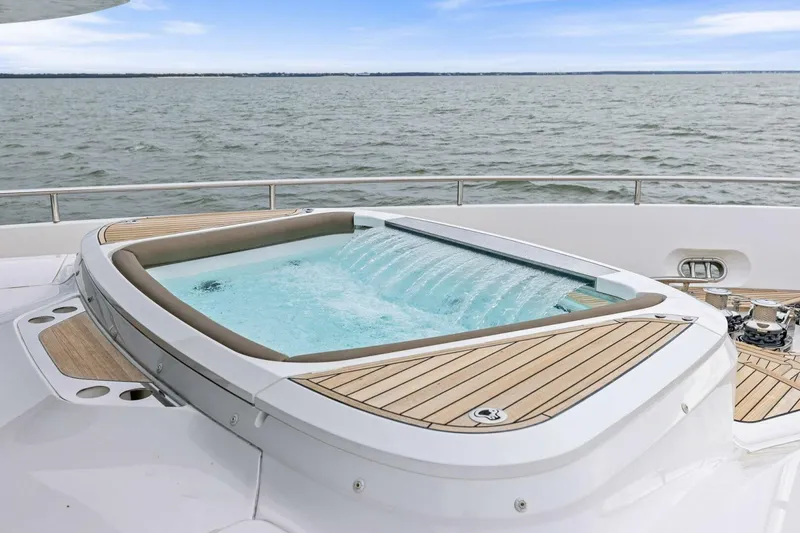 Slide: The Image of Luxurious 2024 Princess X80 yacht with elegant deck jacuzzi and ocean view. - 117