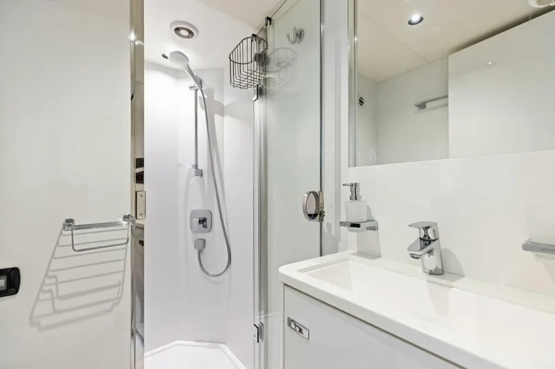 Slide: The Image of Modern bathroom in 2024 Princess X80 yacht with sleek shower and sink design. - 126