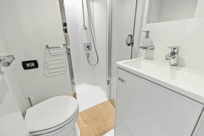 Slide: The Image of Modern bathroom in 2024 Princess X80 yacht, featuring sleek fixtures and compact design. - 127