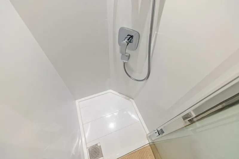 Slide: The Image of Modern shower area in 2024 Princess X80 yacht, featuring sleek design and fixtures. - 129