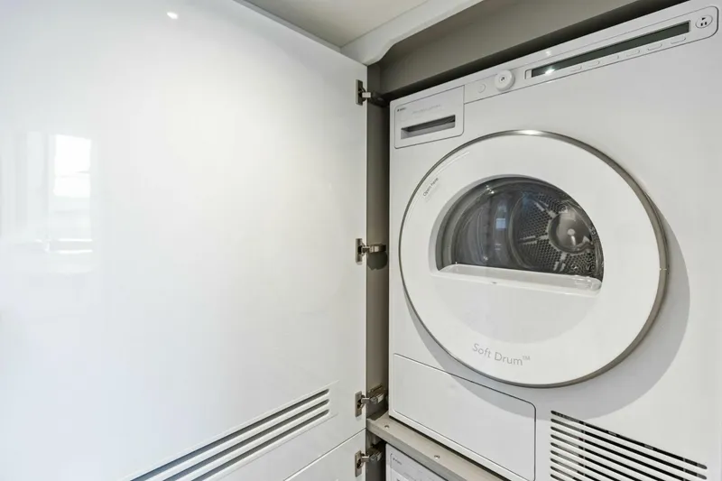 Slide: The Image of Modern laundry area with a built-in dryer, Princess X80, 2024 model. - 131