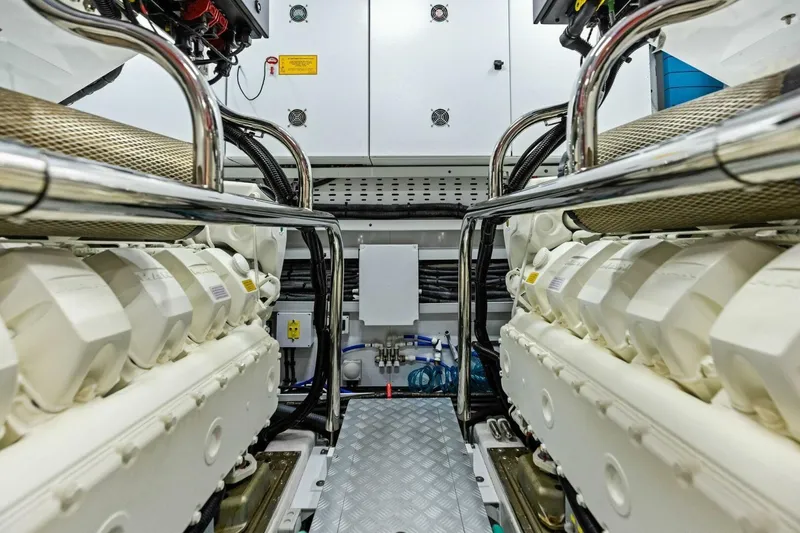 Slide: The Image of Engine room of 2024 Princess X80 yacht, showcasing dual engines and advanced machinery. - 135